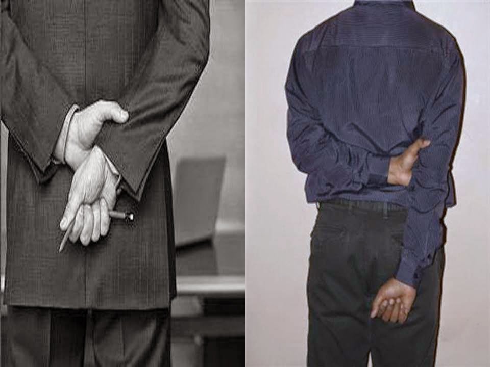 body-language-hands-clasped-in-front-psychmechanics